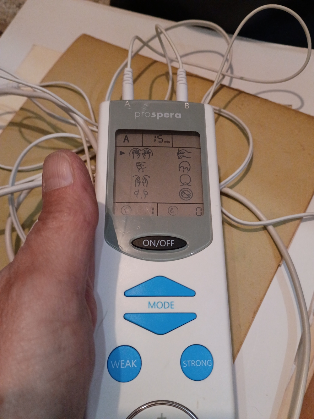 Prospera White Electronic TENS Unit with Blue Buttons